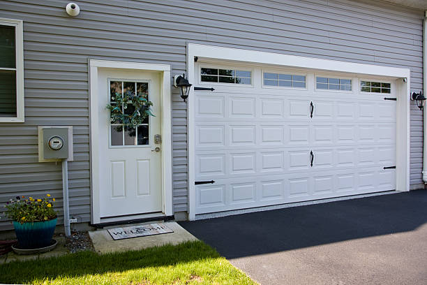 24/7 Emergency Garage Door Panel Replacement experts in Postville, IA